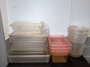 lot 42 image: Assorted Commercial Plastic Pans and Lids, and Measuring Cups