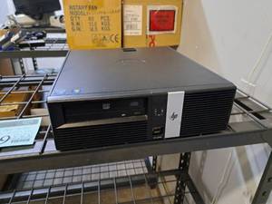 lot 1619 image: HP rp5800 Desktop Computer Tower (for parts only)