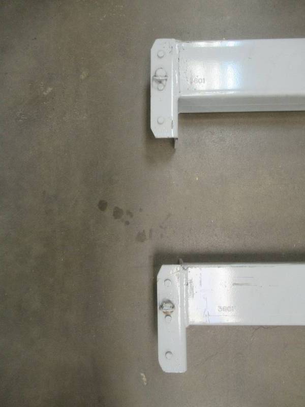 lot 830 image: (2) Teardrop Steel Racking Beams in Gray. Dimensions 96 x 3.  Used in Warehouse, In nice condition. SOLD AS IS.