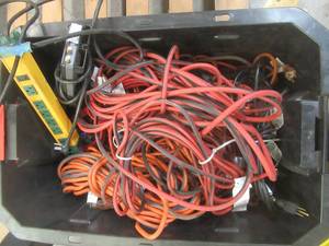 lot 215 image: Large Bin of Miscellaneous Extension Cords and Power Strips, Used in Warehouse, Worked When Replaced - SOLD AS IS