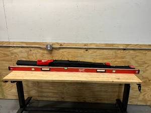 lot 22 image: MILWAUKEE 78 in. REDSTICK Magnetic Box Level with 78 in. Soft Side Level Tool Bag
