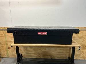 lot 27 image: CRAFTSMAN  71.36-in x 19.57-in x 16.58-in Matte Black Aluminum Crossover Truck Tool Box
