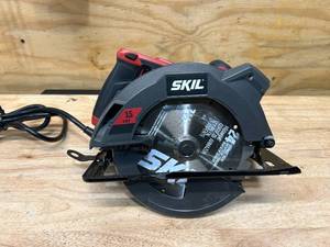 lot 13 image: SKIL 7-14 IN. Corded Circular Saw