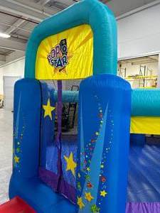 lot 65 image: BOUNCELAND Pop Star Inflatable Bounce House Bouncer, Large Bouncing Area with Long Slide, Climbing Wall, Basketball Hoop, UL 1HP Blower Included, 15 ft x 13 ft x 8.3 ft H, Pop Star Kids Party Theme
