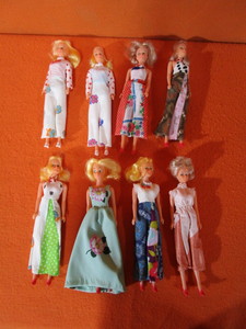 (8) 11 Dolls