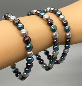 lot 16 image: Trio of Dyed Freshwater Pearl Stretch Bracelets