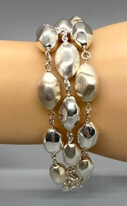 lot 27 image: Sterling Silver Triple Strand Italian Bracelet