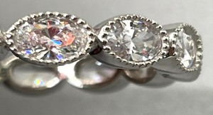 lot 36 image: Subtile Sterling Silver and Cubic Zirconia Ring