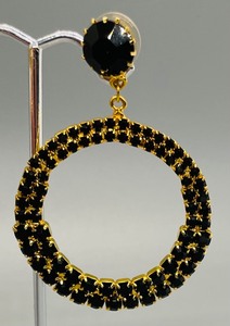 lot 84 image: Golden and Black Rhinestone Costume Dangle Earrings