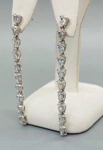 lot 95 image: Dazzling Sterling Silver and Dangly Cubic Zirconia Earrings