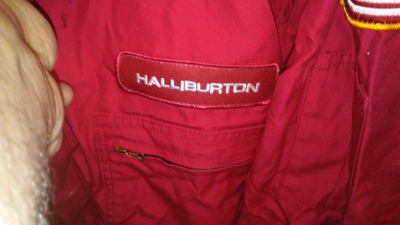 lot 99 image: Halliburton Reflective Coveralls