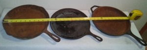 lot 44 image: (3) Pieces Cast Iron Cookware