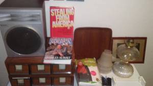 lot 123 image: Misc. Cassettes, Atomic Clock, oil Lamp and  More.