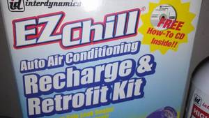lot 124 image: EZ Chill Auto AC Recharge Kit.