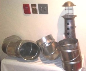 lot 130 image: 8 Inch Duct Work Conners And Chimney.