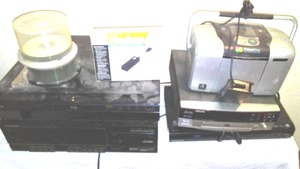 lot 202 image: Electronics and Discs. Power Cords, NO Remote Controls.
