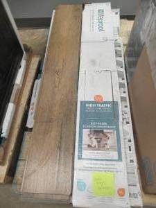 lot 328 image: Lifeproof Golden Larch Oak 7.13 in. W x 48.03 in. L Waterproof High Traffic Luxury Vinyl Plank Flooring (19.05 sq. ft.case) (ENDS ARE CHIPPED, SEE PHOTOS) - 3 CASES TOTAL - APPROXIMATELY 57 SQUARE FEET