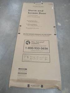 lot 436 image: Andersen 32 in. x 80 in. 400 Series White Universal Self-Storing Aluminum Storm Door with Nickel Hardware