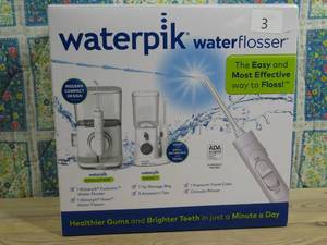 lot 3 image: Waterpik Evolution and Nano Water Flosser Combo Pack