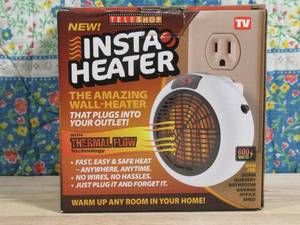 lot 24 image: Insta Heater Plug-in Heater The Amazing Wall Heater 600w Temp Control with Stay Cool Housing