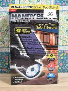 lot 36 image: Handy Brite Solar LED Spotlight - Solar Powered Motion-Activated LED Security Light
