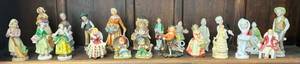 Shelf Full Of Misc. Antique Figurines
