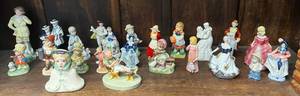 Shelf Full Of Misc. Antique Figurines