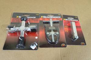 lot 236 image: Gear Wrench Three Way Battery Tool, Battery Puller and Metric Feeler Gauge