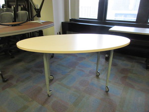 lot 631 image: STEELCASE, OVAL, ADJUSTABLE HEIGHT TABLE