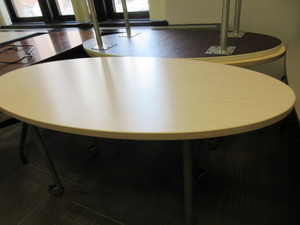 lot 632 image: STEELCASE OVAL ADJUSTABLE HEIGHT TABLES