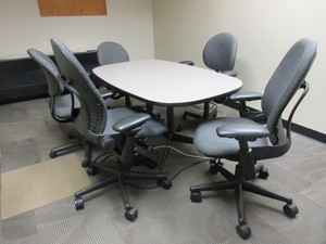 lot 653 image: HERMAN MILLER EAMES CONFERENCE TABLE AND STEELCASE CHAIRS