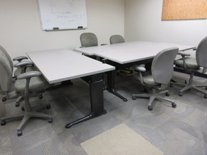 lot 665 image: HEIGHT ADJUSTABLE WORK TABLES WITH HERMAN MILLER AMBI CHAIRS