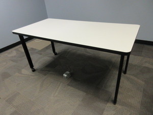 lot 624 image: ROLLING ADJUSTABLE TABLE