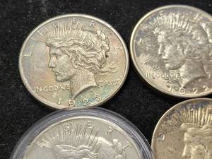 GROUP OF 4 US PEACE SILVER DOLLARS AS PICTURED