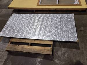 lot 24 image: 2 sheets of reflective silver 6 x 29.5