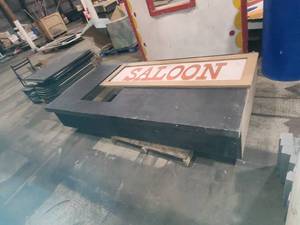 lot 74 image: 2 pallets black props with saloon sign