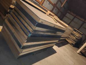 lot 102 image: black plywood stage bases 4x8
