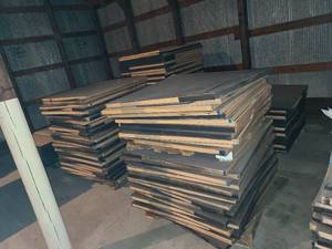lot 105A image: back stacks of 48 x 48 double sided peg boards