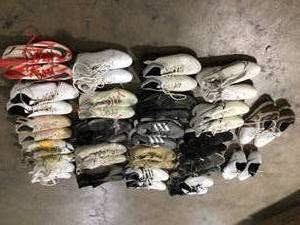 lot 22 image: Mix Lot of assorted Soccer and Football Cleats, Review all pictures