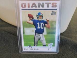 lot 43 image: 43. 2004 Topps Eli Manning Rookie C...