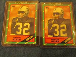 lot 175 image: 175. 2 1986 Topps Marcus Allen Card...