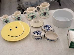 lot 395 image: Lot of (11) Housewares - Decorative Grape Theme Pitchers, Small Candy Dishes, Small Saucer, Large Smiley Plate, White Jar