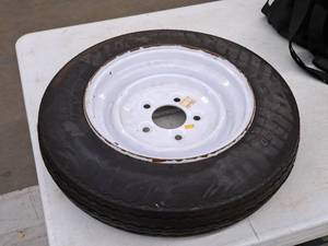 lot 416 image: Carlisle ST 880 Trailer Tire with 5-Lug Steel Rim