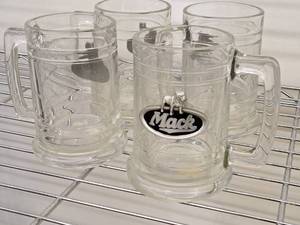 lot 465 image: Lot of (4) 5-12 Mack Truck Bulldog Beer Mugs
