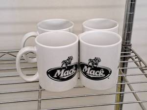 lot 466 image: Lot of (4) 4 Mack Truck Bulldog Coffee Mugs