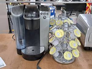 lot 141 image: Keurig Machine with (2) Dispenser Trays and multiple Earl Grey Tea Cups