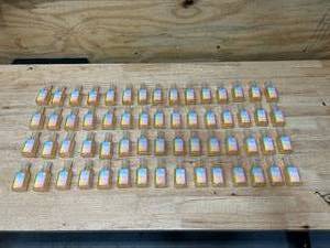 lot 122 image: Lot of 60- Coconut Macaroon Hand Sanitizer (1 oz bottles)