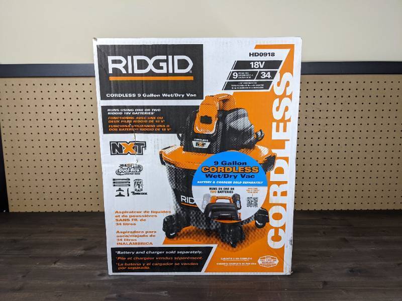 lot 108 image: New RIDGID 9 Gal. 18-Volt Cordless NXT WetDry Shop Vacuum with Filter Hose and Accessories