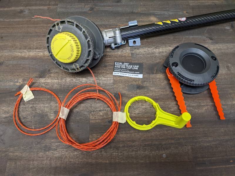 lot 151 image: RYOBI 40V HP Brushless 15 in. Cordless Carbon Fiber Shaft Attachment Capable String Trimmer with 4.0 Ah Battery and Charger