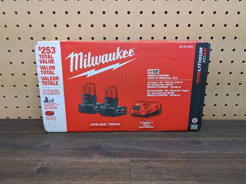 lot 9 image: Milwaukee M12 12-Volt Lithium-Ion Starter Kit with Two 6.0 Ah Battery Packs and Charger